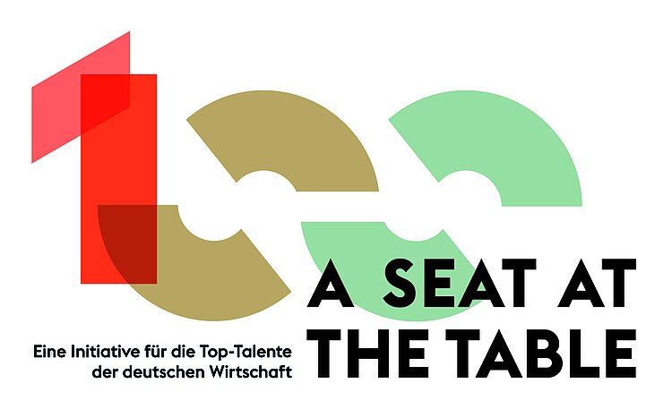 Schriftzug: „A Seat At The Table“